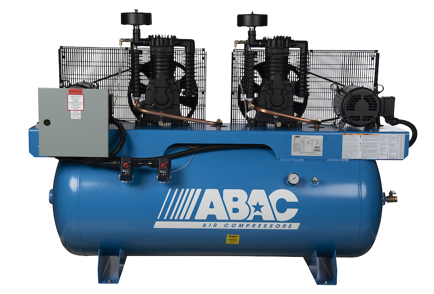 How much air does the compressor deliver at 100 psi?